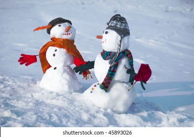 Two Snowmen - A lovely couple - Powered by Shutterstock