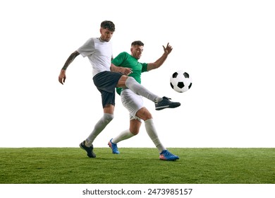 Two soccer players vie for control of ball on green lash playground against white background. Concept of professional sport, championship, final match, movement. Ad - Powered by Shutterstock