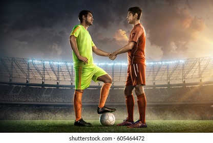 two soccer team captains on a soccer stadium - Powered by Shutterstock