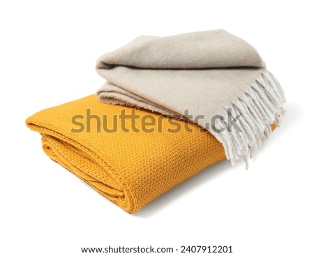 Two soft warm blankets isolated on white