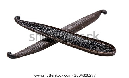 Two split vanilla beans showing dark aromatic seeds inside