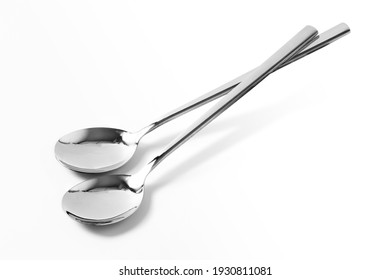 Two Spoons On White Background