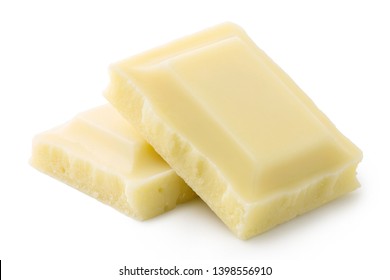 Two squares of white chocolate isolated on white. Rough edges.
