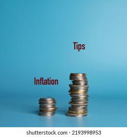 Two Stacks Of Coins Side By Side Show The Difference In Tip Growth Versus Inflation