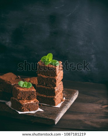 Similar – quadratische Stücke Schokoladenbrownie