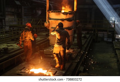 Two Steelworkers At The Steel Plant