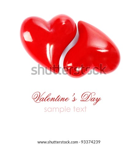 two stone hearts isolated on white - yin-yang concept (with sample text)