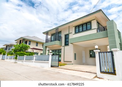 Two Storey House With Fence