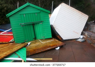 Two Storm Damaged Beach Huts And Debris,Upside Down Hut Next To One The Right Way Up.

