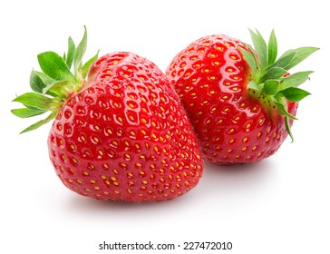 Two strawberries close up on white background - Shutterstock ID 227472010