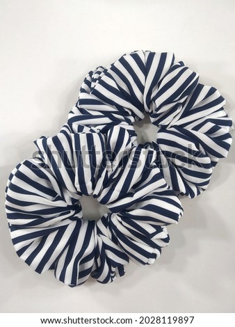 Two striped scrunchie on a white background