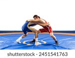 Two  strong men in blue and red wrestling tights are wrestling  on a white background. Wrestlers doing grapple. 