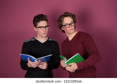 Two students in the classroom. Red background.