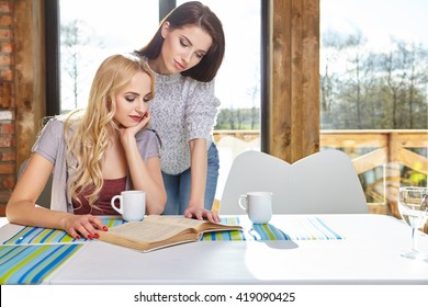 Two students learn in home