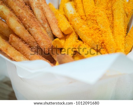 two style potatoes french fries group in facial paper packaging 