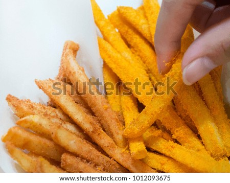 two style potatoes french fries group in facial paper packaging 