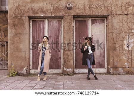 Similar – Couple of tourists walking down the street