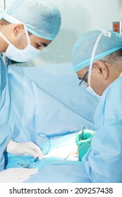 Two Surgeons Working 