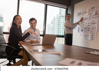 Two Talkative Workmate Do Not Pay Attention To Year Plan Project Present Meeting.