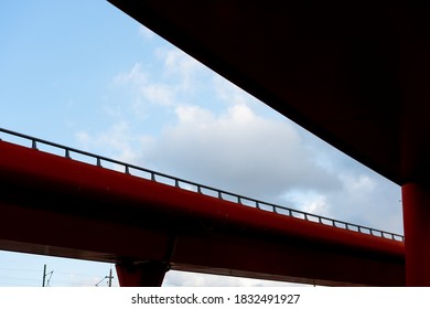 Two Tall Red Road Viaducts Joining