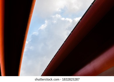 Two Tall Red Road Viaducts Joining