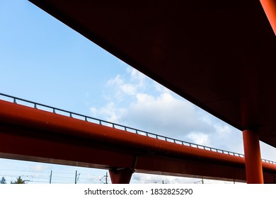 Two Tall Red Road Viaducts Joining