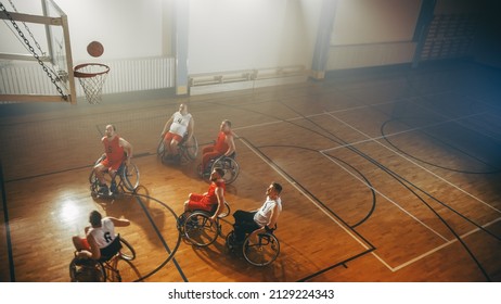 Two Team Wheelchair Basketball Game on Professional Court. Paraplegic Players Compete, Shoot, Score Goal Points. Determination, Skill of People with Disability. High Angle, Aerial Shot - Powered by Shutterstock