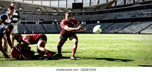 Two teams of multi-ethnic rugby players playing rugby at a sports stadium, wearing team strip, one player throwing a rugby ball. Sport and competition concept digital composite. - Powered by Shutterstock
