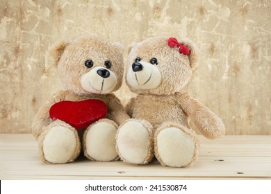 Two Teddy Bear With Heart On Wood Grunge Background,concept Valentine ,vintage Retro Tone
