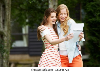 Two Teenage Girls Celebrating Successful Exam Results