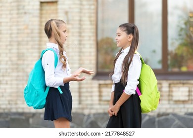 two teenage girls friends talking together outdoor - Shutterstock ID 2177848527