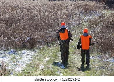 Two Teenagers Deer Hunting In The Midwest