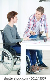 Two teens doing their homework