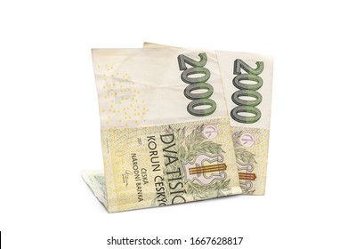 Two thousand czech krona bills on white.