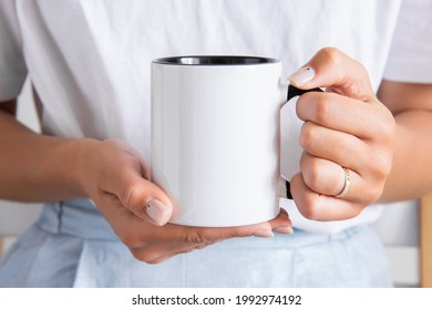 Two Tone Black And White Mug Mockup For Presentation Sublimation Designs. Stock Photos Of White Coffee Mug In The Female Hands  For Designers