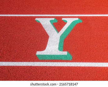 Two Tone Y Painted On Running Track.	