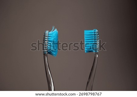 Two toothbrushes are displayed side by side, showcasing one new and one worn out. They emphasize the necessity of replacing toothbrushes for effective dental care and maintaining oral hygiene.