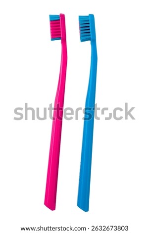 Two toothbrushes isolated on a white background