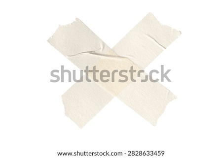Two torn light colored fabric strips crossed against plain white background with evoking minimalist delicate aesthetic unblemished white backdrop diagonally against smooth