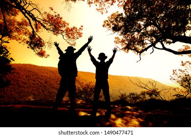 Two Tourisms Or Traveler Happy And Show  Arms Togeter  In Forest, Nature In The  Morning Sillhouette Image