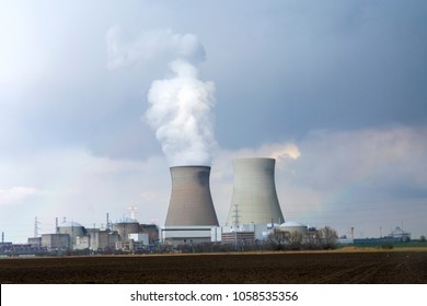 Two Towers Of A Nuclear Power Plant, One Of Which Has Been Shut Down And The Other Is Still Operational