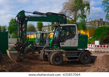 Two tractors in a row