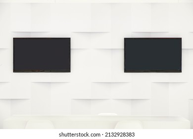 Two Tvs On A White Wall. Modern Stylish Interior Design