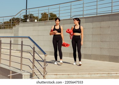 Two Twin Sisters Play Sports On The Street