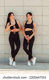 Two Twin Sisters Play Sports On The Street