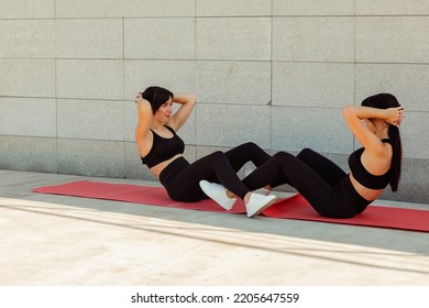 Two Twin Sisters Play Sports On The Street