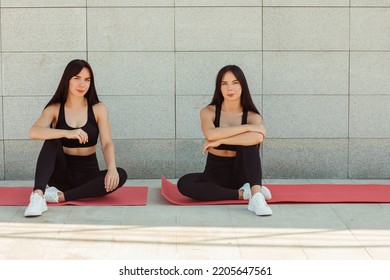 Two Twin Sisters Play Sports On The Street