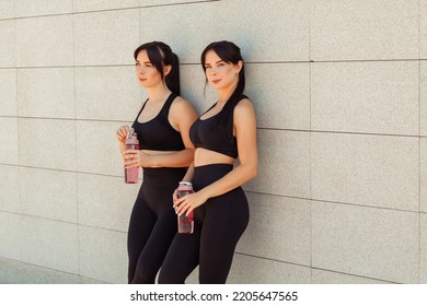 Two Twin Sisters Play Sports On The Street