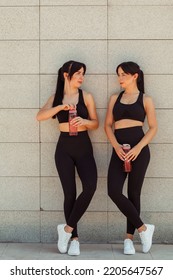 Two Twin Sisters Play Sports On The Street