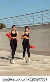 Two Twin Sisters Play Sports On The Street